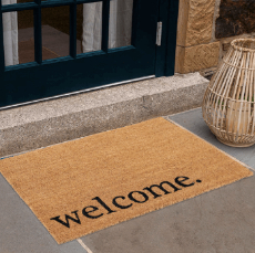 Photo of coir mat with welcome printed on it