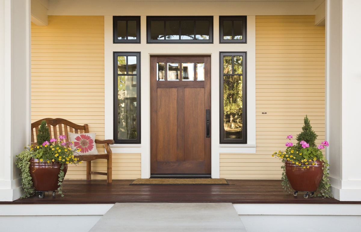 Front door with large coir mat at the entrance way